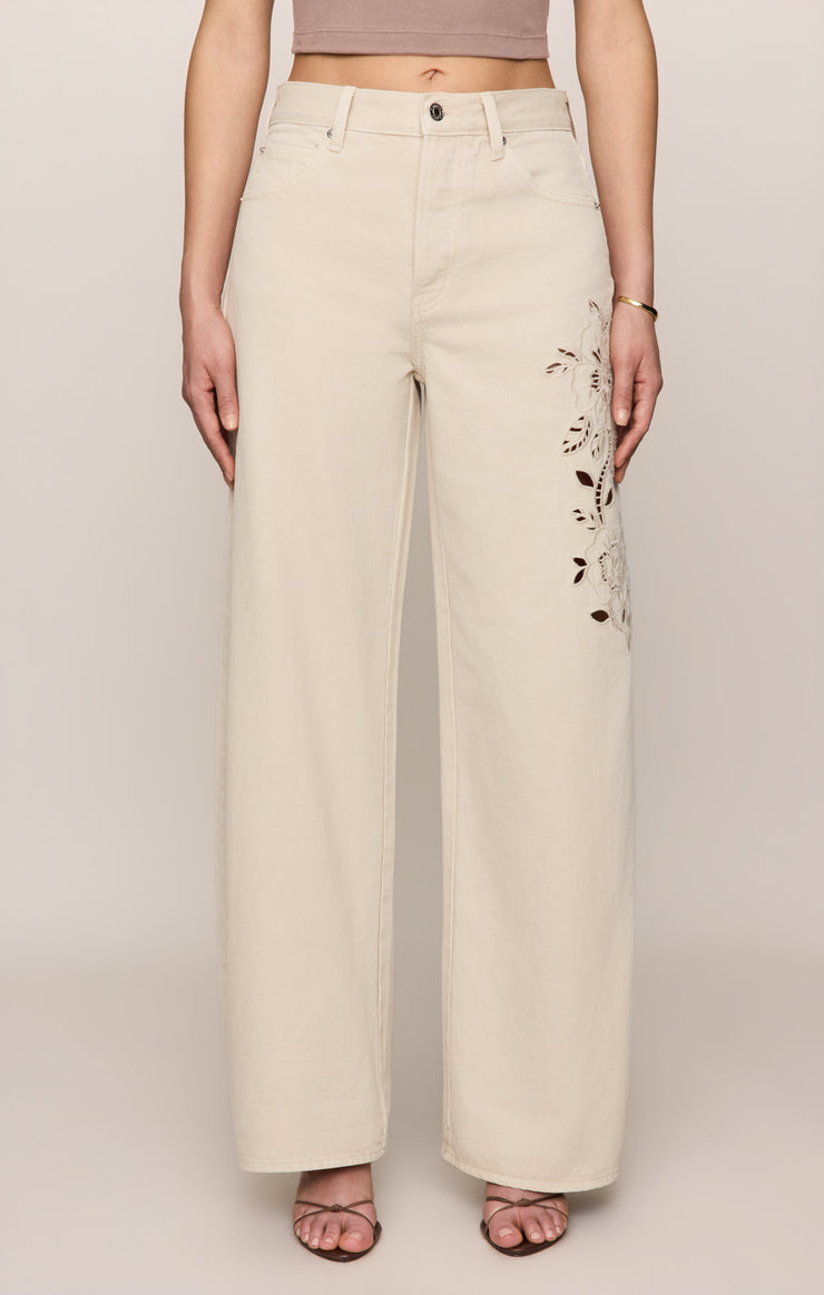 The Show Off Soapstone Eyelet Bowed Jeans